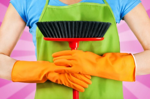 Carpet cleaning team preparing equipment safely before work